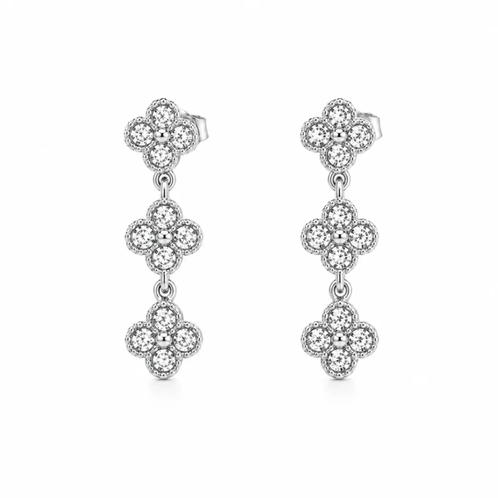 Boucles d'oreilles pendantes triple trèfle strass argentées